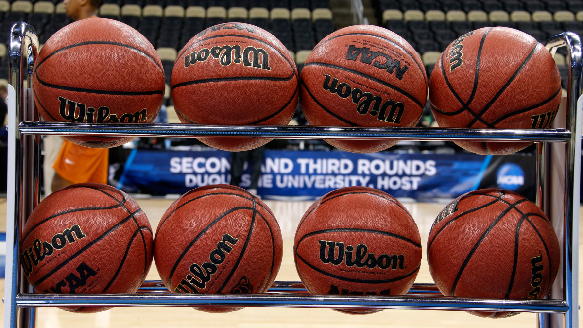 Men's college basketball rules changes: Shot clock to be reduced ...