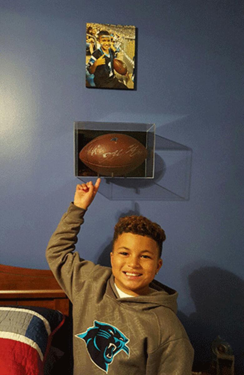 Jaden's ball is now on display in his bedroom.