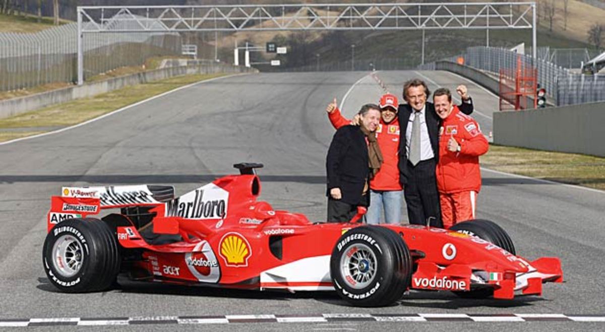 Luca di Montezemolo with F1 legend Michael Schumacher (far right).