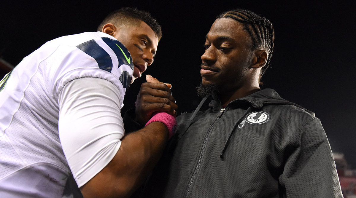 RG3 and Russell Wilson (Patrick Smith/Getty Images)