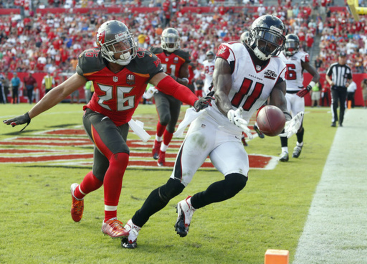 Tampa Bay Buccaneers cornerback Sterling Moore (26) knocks a pass away from Atlanta Falcons wide receiver Julio Jones (11) in the end zone during the second quarter of an NFL football game Sunday, Dec. 6, 2015, in Tampa, Fla. (AP Photo/Brian Blanco)