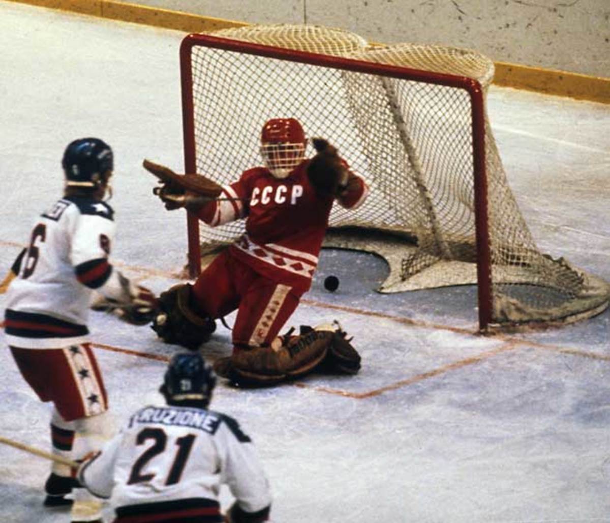 Mike Eruzione (21) of the U.S. wristed the winning goal past Vladimir Myshkin at Lake Placid in 1980.