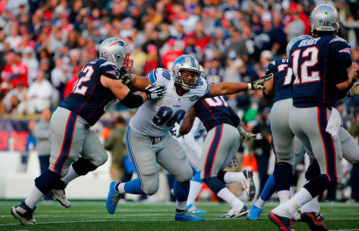 Ndamukong Suh's ability to pressure Tom Brady up the middle was a central reason the Dolphins broke the bank to land the prized free agent. (Winslow Townson for Sports Illustrated/The MMQB)
