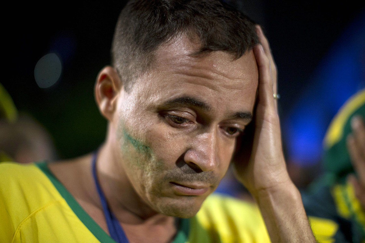 distraught-brazil-fan-adec9c06b6bb4f13b6cb1fe71a2ea209-0.jpg