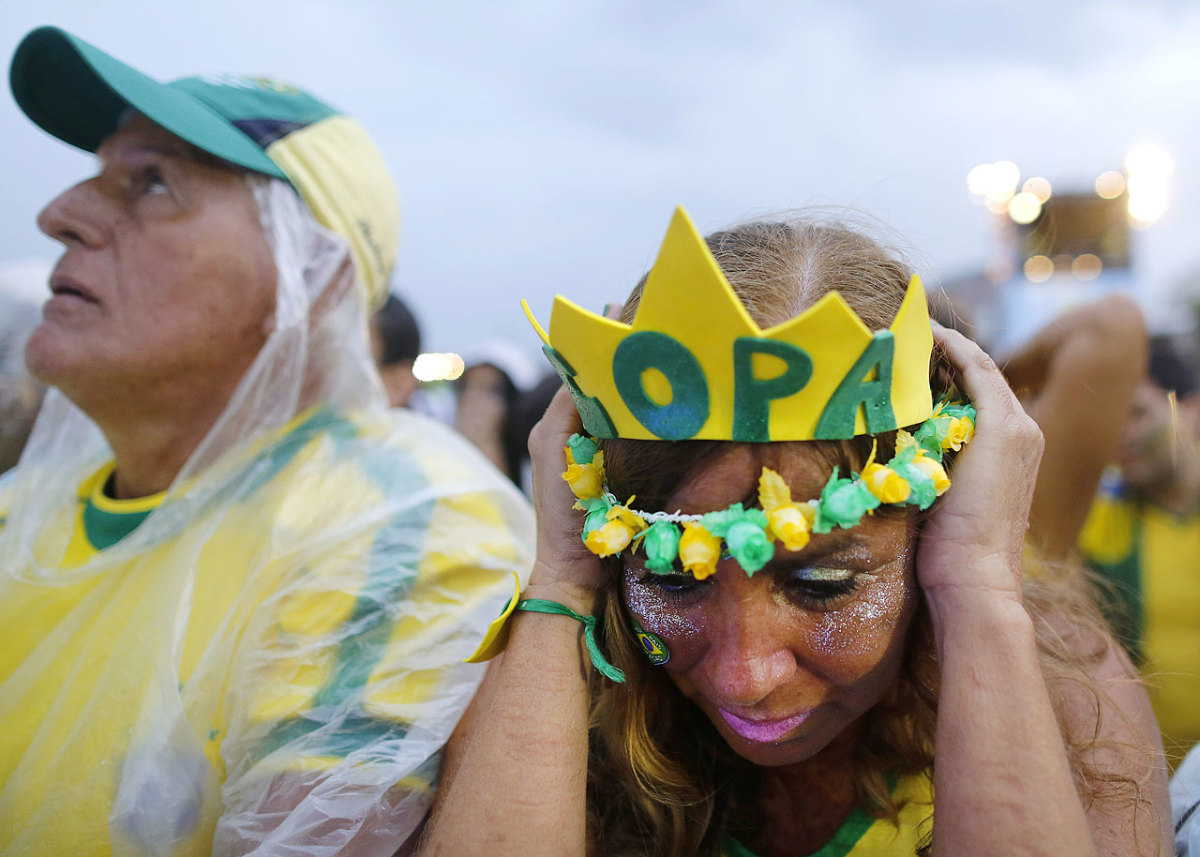 distraught-brazil-fans-9e81f36bf5c940c9b4a7a3fa7c64563a-0.jpg