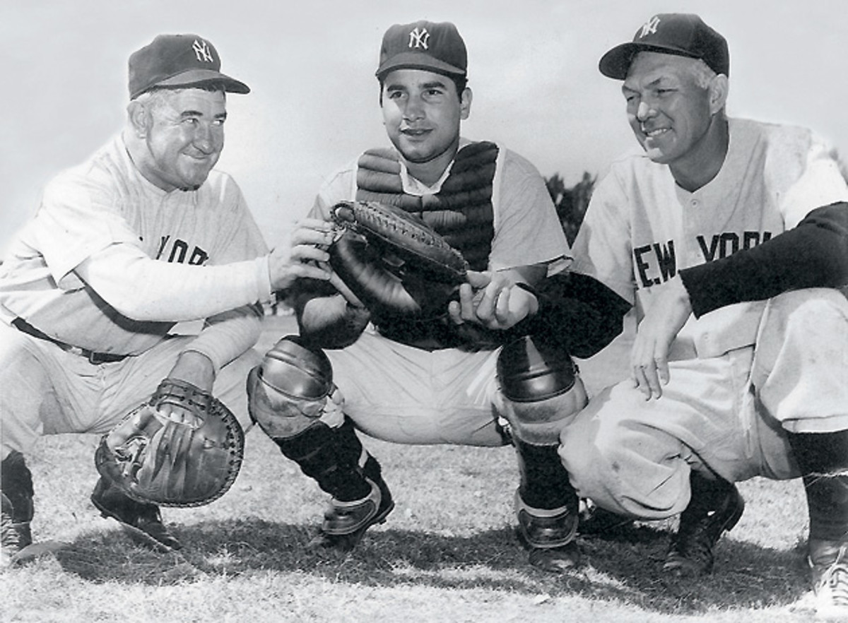 Being welcomed to the Yankees by legendary catchers Cochrane (left) and Dickey should have been a great thrill for the young Malangone, but his smile was deceptive.