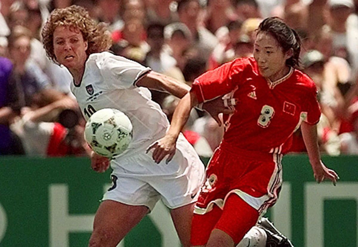Michelle Akers, left, battles China's Yan Jin in the 1999 FIFA Women's World Cup final