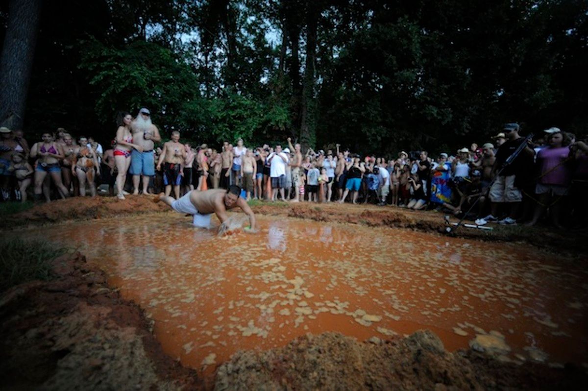 Party-goers seek respite from the heat in LOL's new swimming pool.