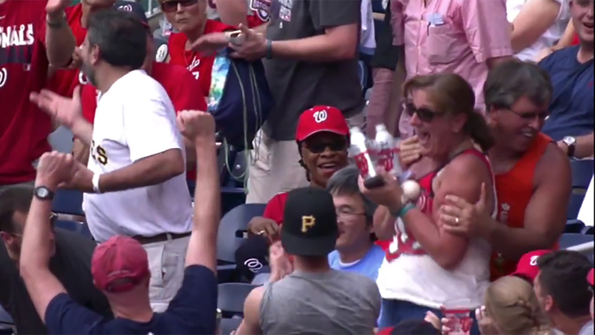 Video Washington Nationals fan catches foul ball with beer Sports Illustrated