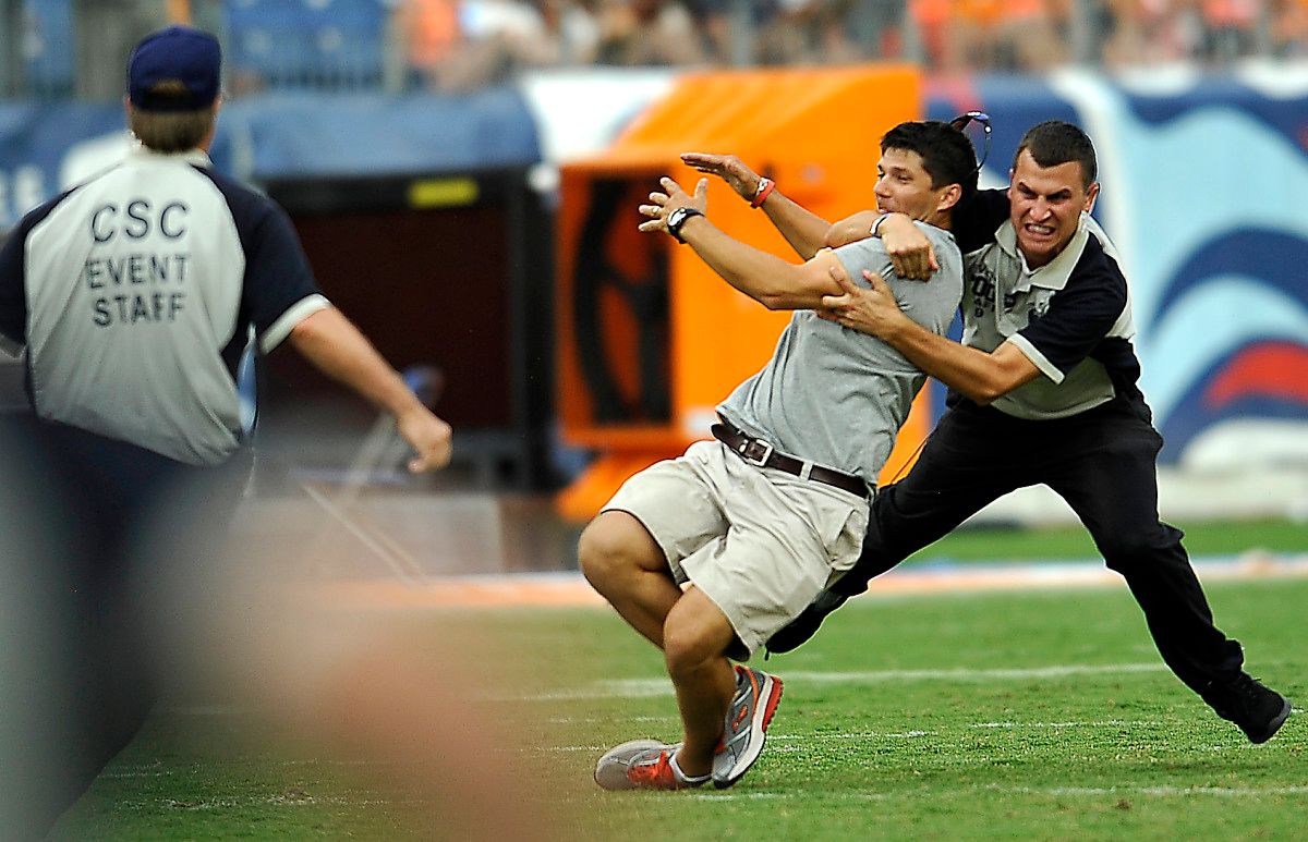 Security Grabs Fan Who Ran On Field During Weather Delay Sports