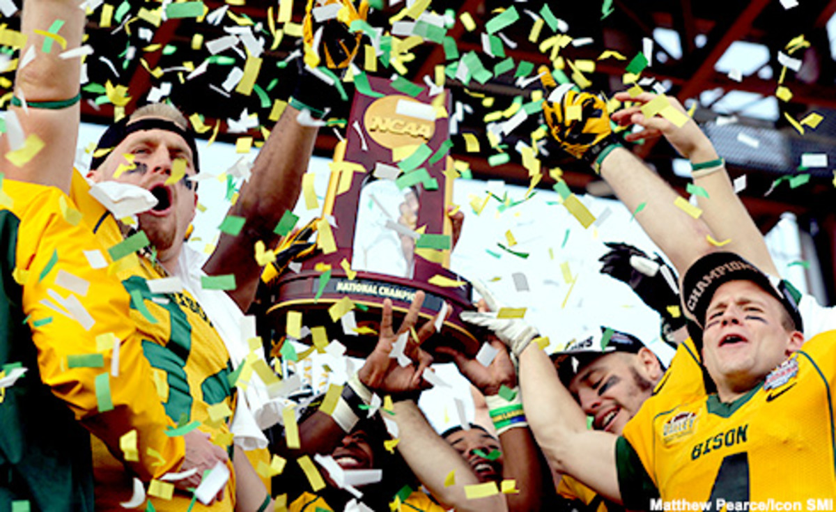 04 January 2014: North Dakota State Bison players celebrate after winning the game between the North Dakota State Bison and the Towson Tigers in the 2014 Division 1 Championship game at Toyota Stadium in Frisco, Texas. North Dakota State beats Towson 35-7