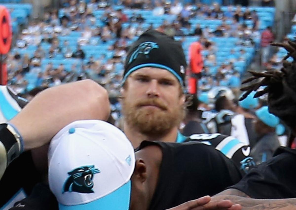 Photo: Panthers TE Greg Olsen is not smiling with teammates - Sports