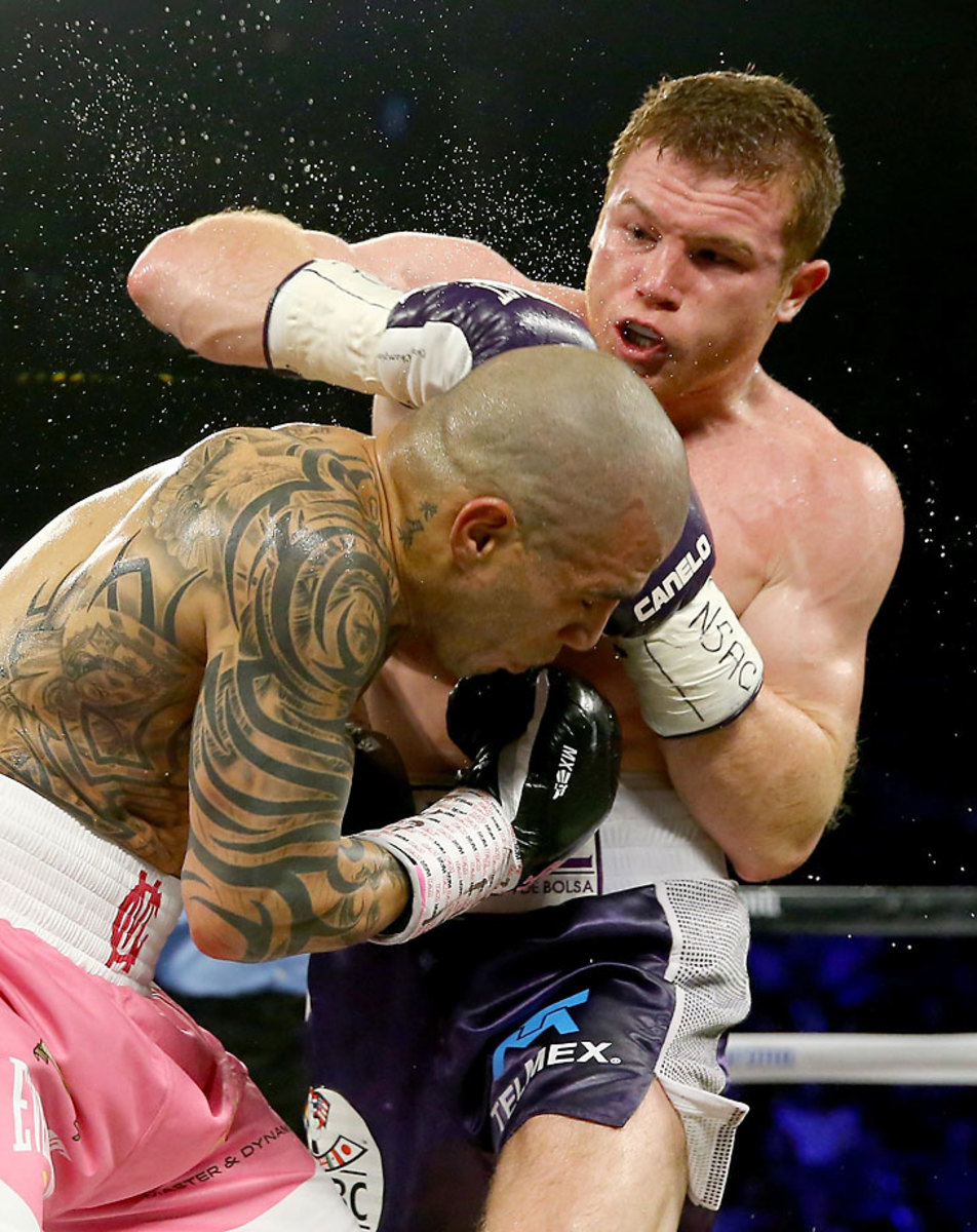 Saul Canelo Alvarez defeats Miguel Cotto pictures - Sports Illustrated, image size:952x1200