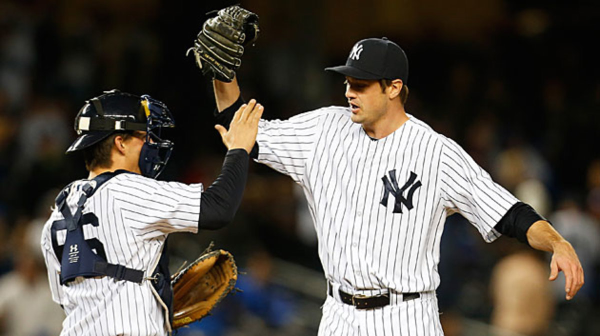 With closer Andrew Miller anchoring their stellar bullpen, the surprising Yankees are in first place.