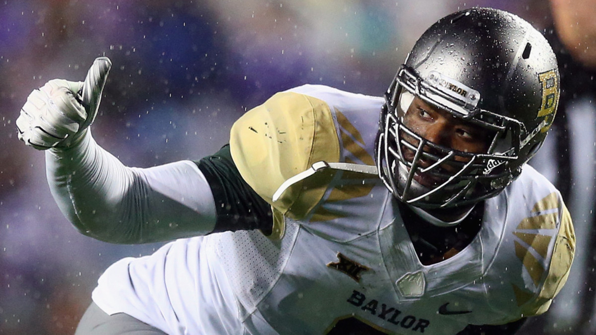 Watch TCU's punter gets off kick before Shawn Oakman hit Sports