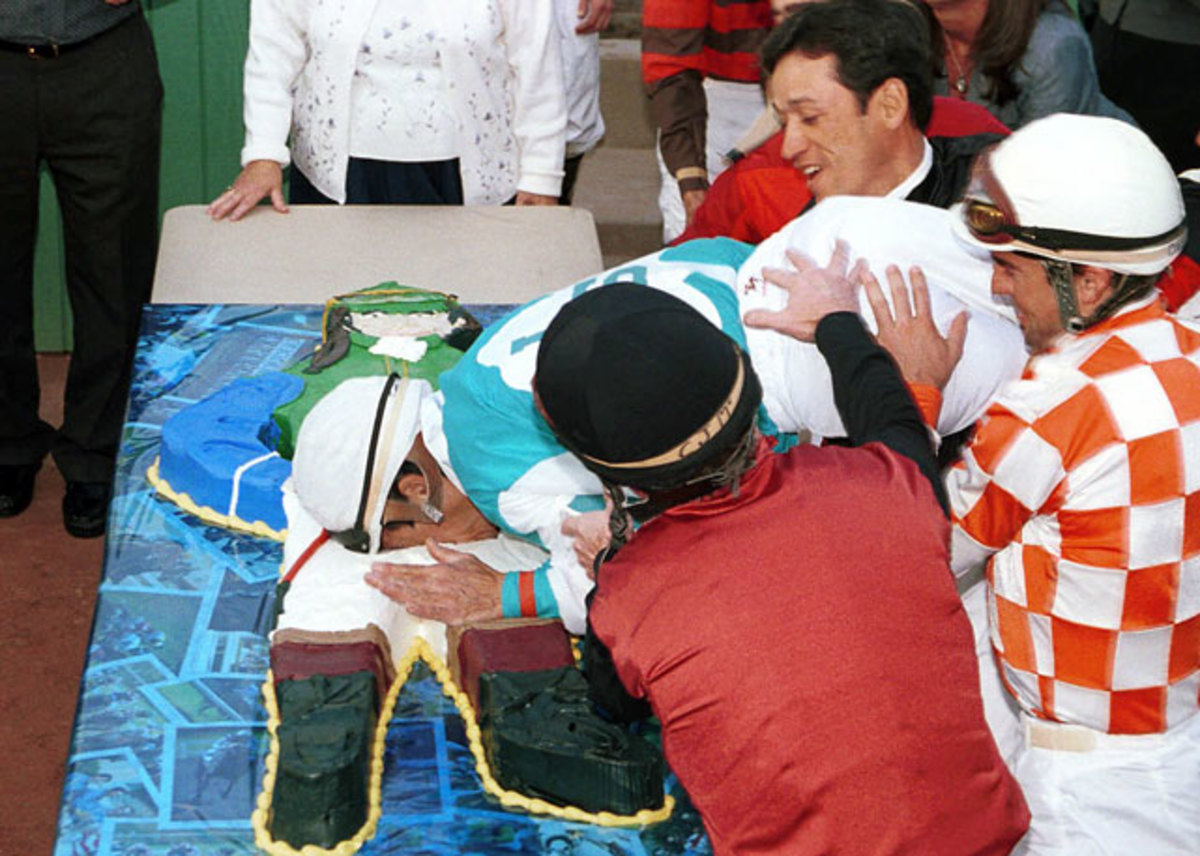 Jockey Laffit Pincay Jr. got a taste of his life-size cake for his 53rd birthday. That's awkward.