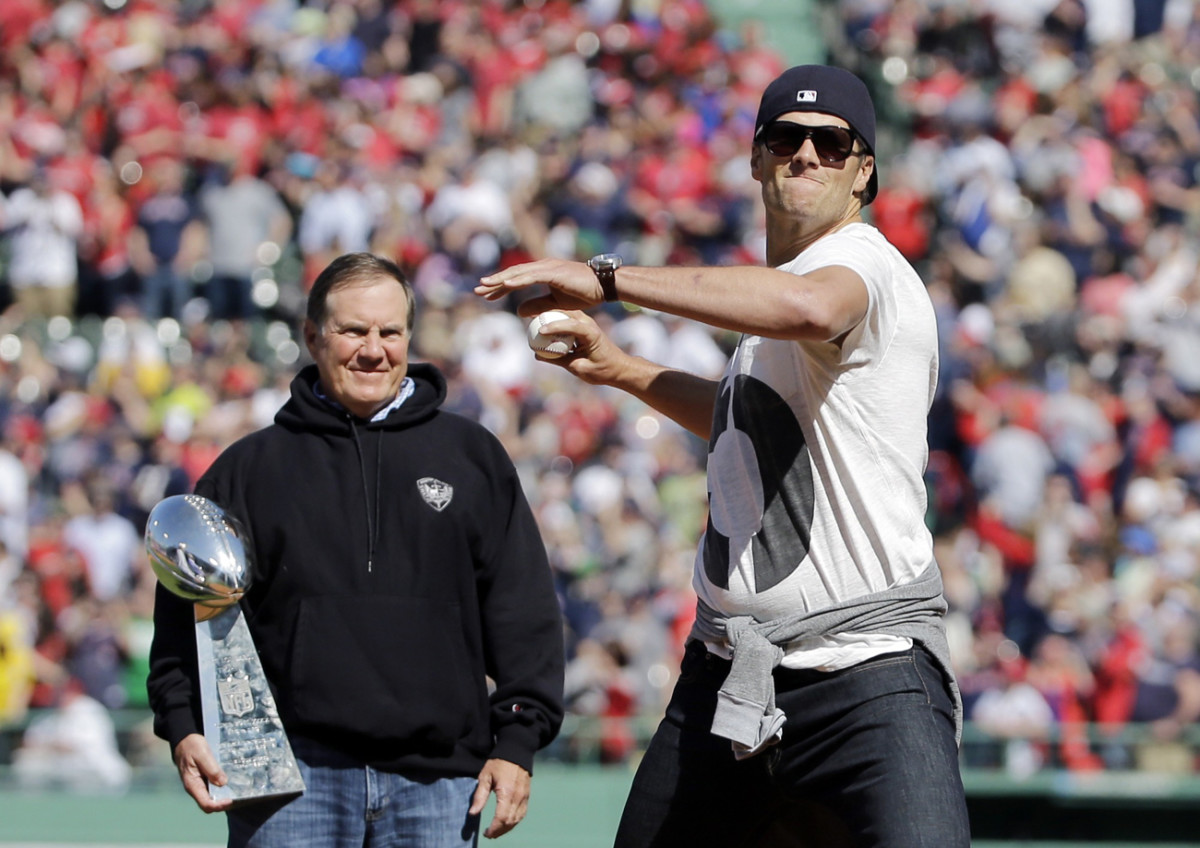 First pitch at Fenway, Lombardi in tow, April 2015. (Photo: Elise Amendola/AP)
