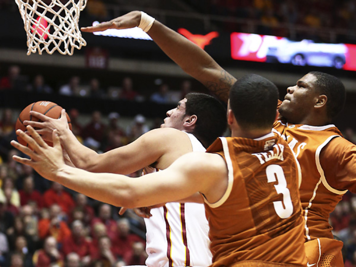 Georges Niang (with ball) cuts through the Texas defense during Iowa State's win over the Longhorns. (Justin Hayworth/AP)