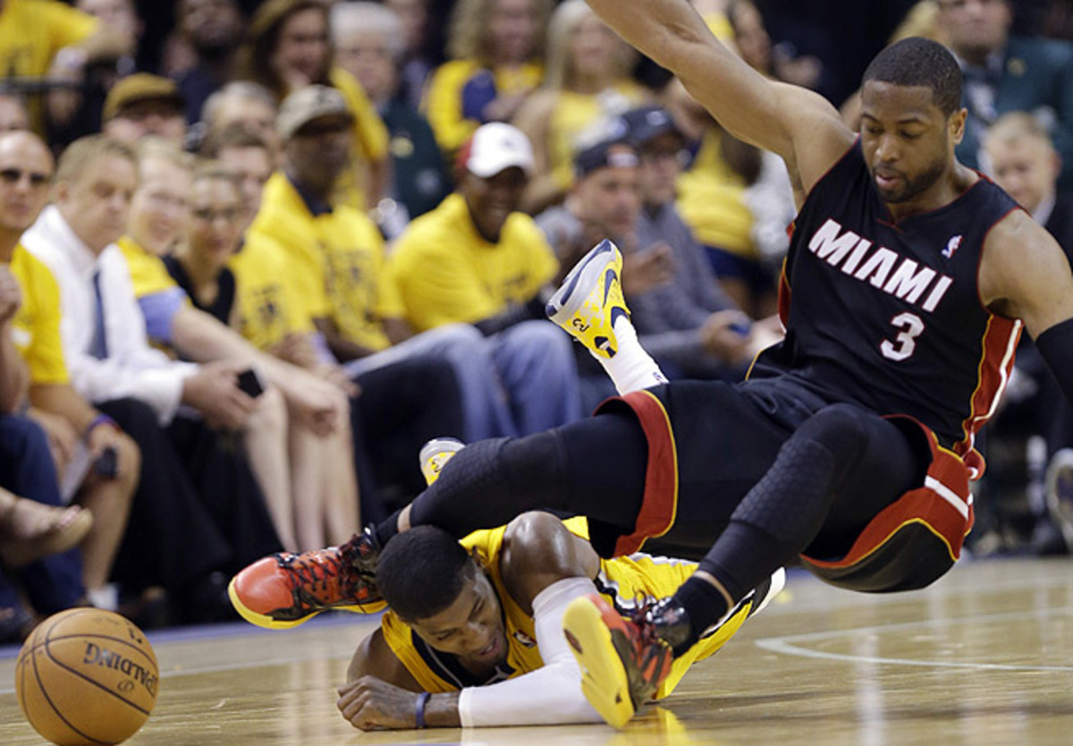Paul George needs to pass more concussion tests before being cleared for Game 3 against the Heat. (Michael Conroy/AP)