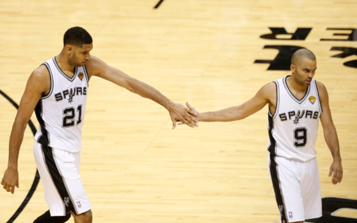 Tim Duncan and Tony Parker led the Spurs to a game one victory on Thursday night. (Joe Murphy/NBA/Getty Images)