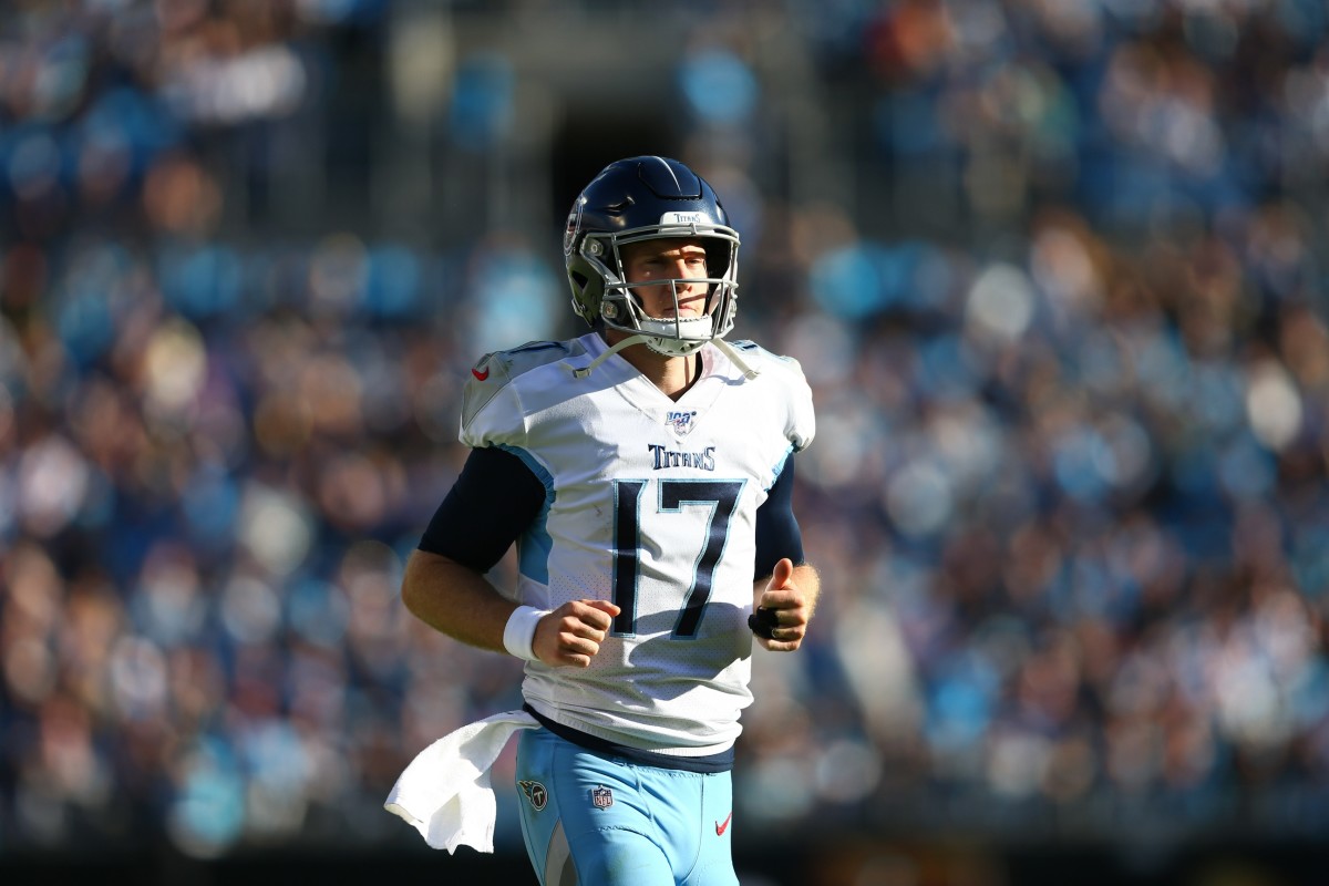Tennessee Titans quarterback Ryan Tannehill (17) jogs onto the field during the second half against the Carolina Panthers at Bank of America Stadium.