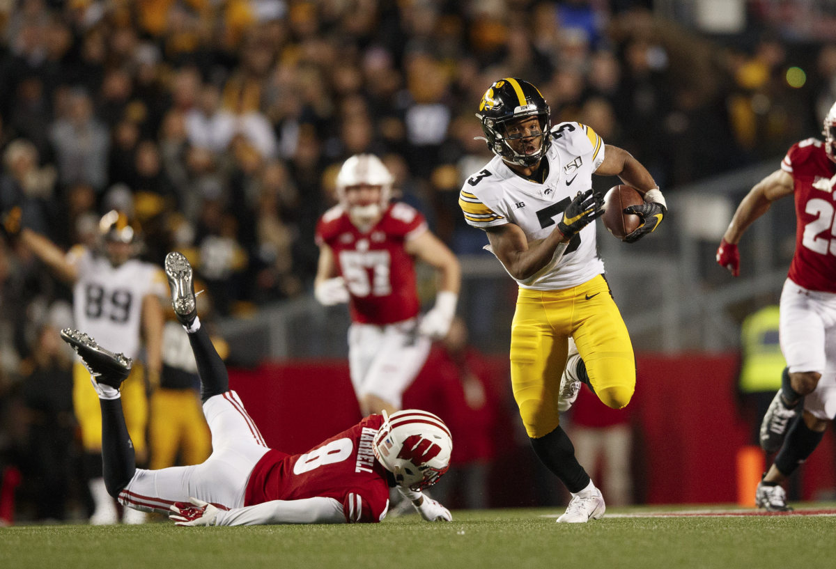 Iowa's Tyrone Tracy races to a 75-yard touchdown in the fourth quarter of Saturday's game.