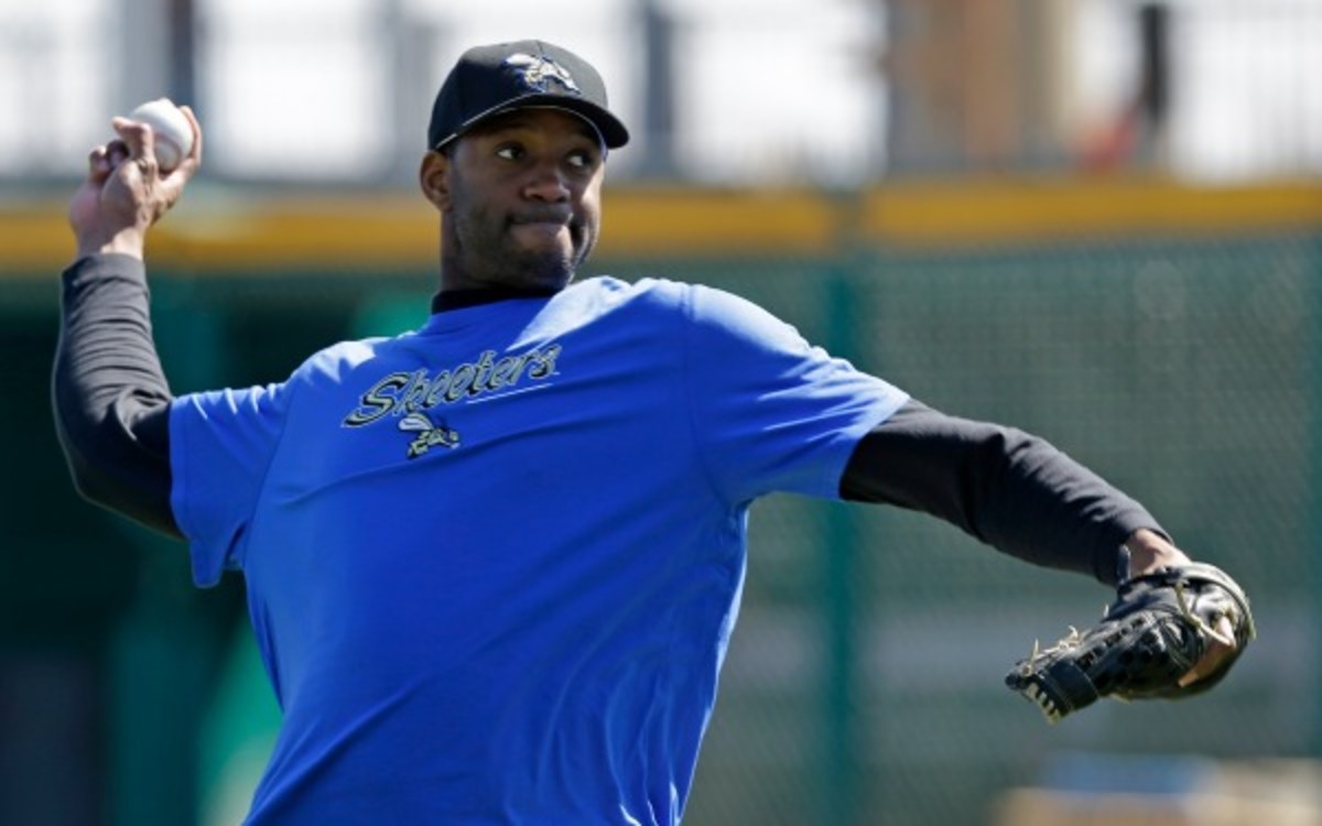 Two-time NBA scoring champion Tracy McGrady hopes to earn a spot with a independent baseball team. (AP Photo/Pat Sullivan)