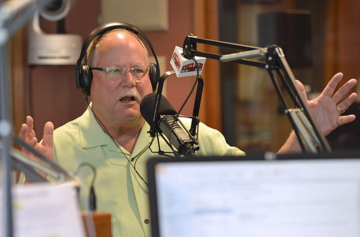 Radio appearances are one thing that keeps Holmgren close to the sports world. (Rod Mar/Sports Illustrated)