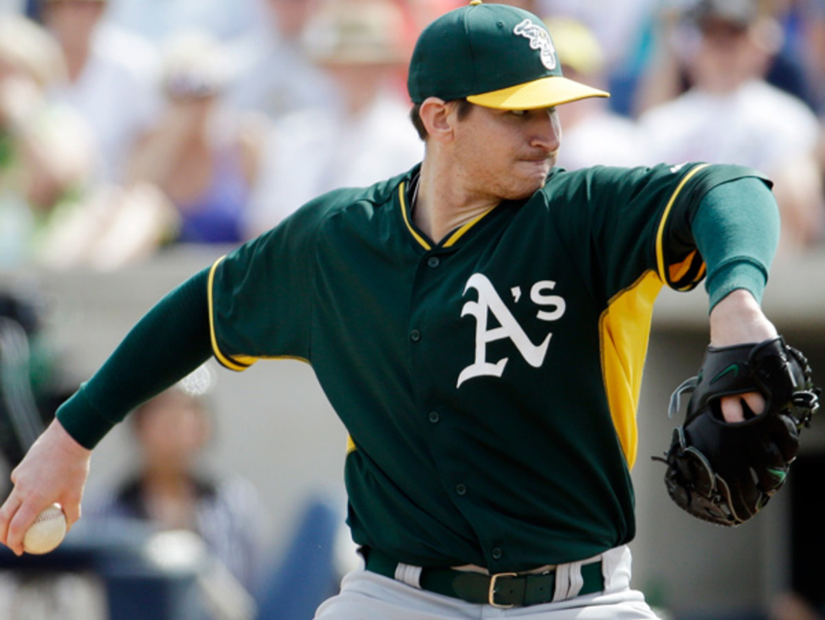 Jarrod Parker's upcoming Tommy John surgery will be the second his young career. (Morry Gash/AP)