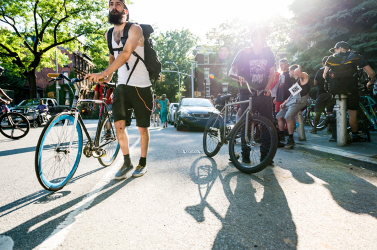 Competitors fill the streets outside the Brooklyn Masonic Temple as they get ready for racing at Red Bull Mini Drome in Brooklyn, NY.