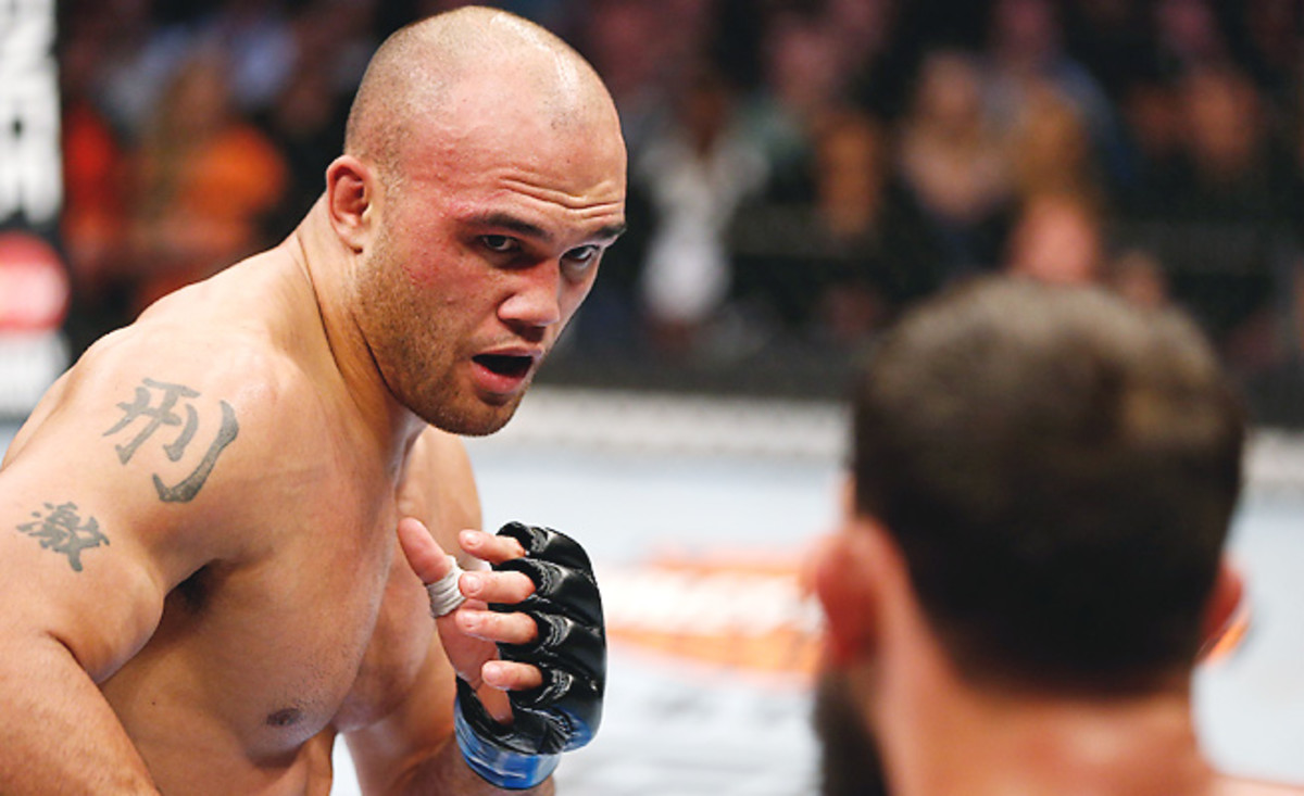 si/dam/assets/140318152235-robbie-lawler-ufc-welterweight-johny-hendricks-single-image-cut.jpg