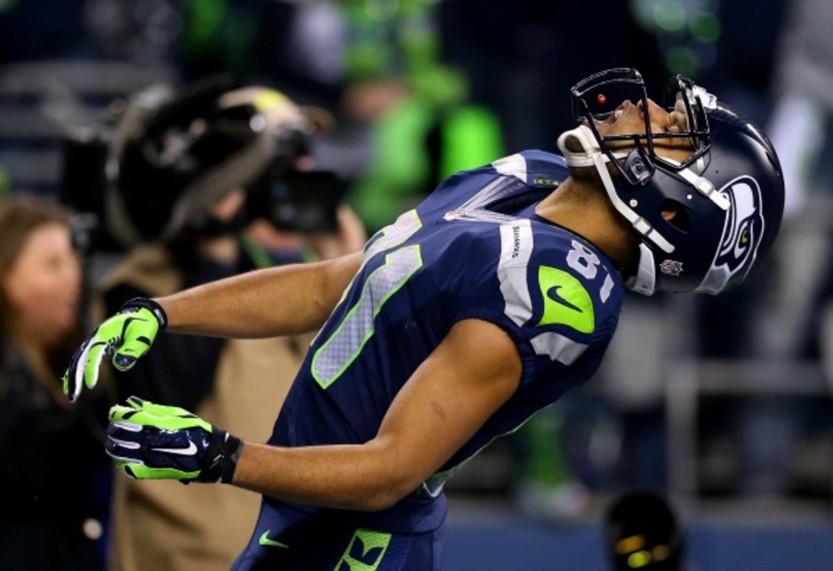 Seahawks receiver Golden Tate catches a Skittles in his mouth after a Marshawn Lynch touchdown. (Ronald Martinez/Getty Images)