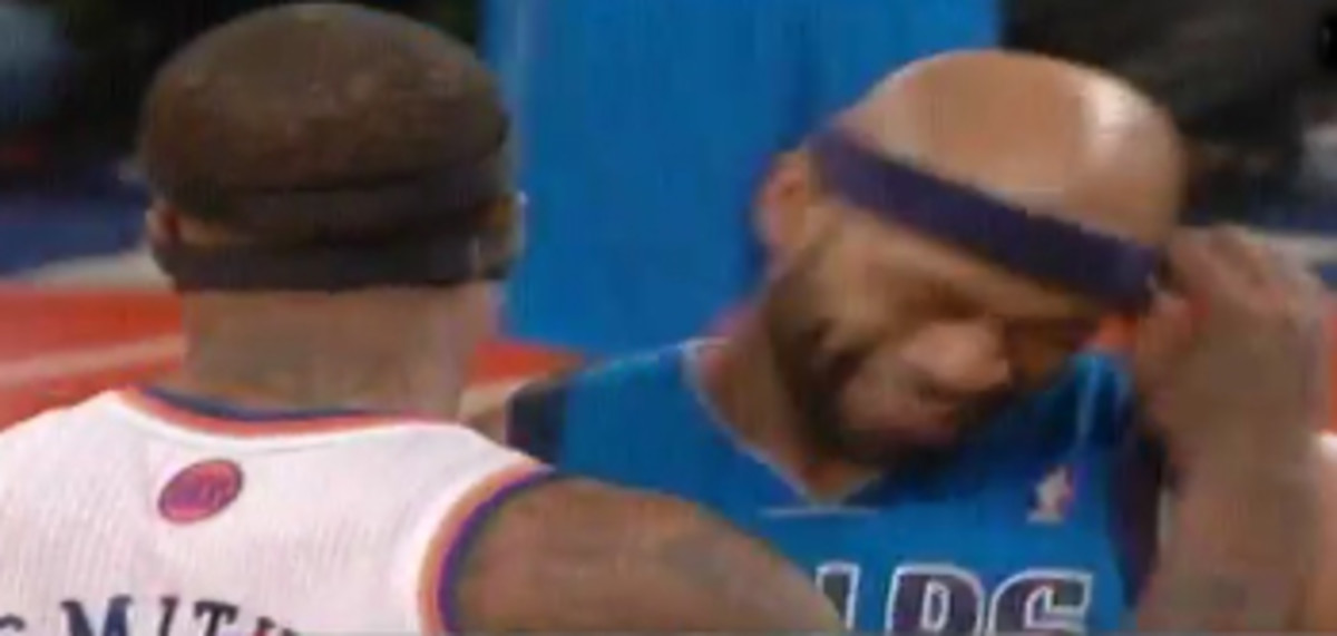 J.R. Smith pulled down Vince Carter's headband during a game. (MSG Network)