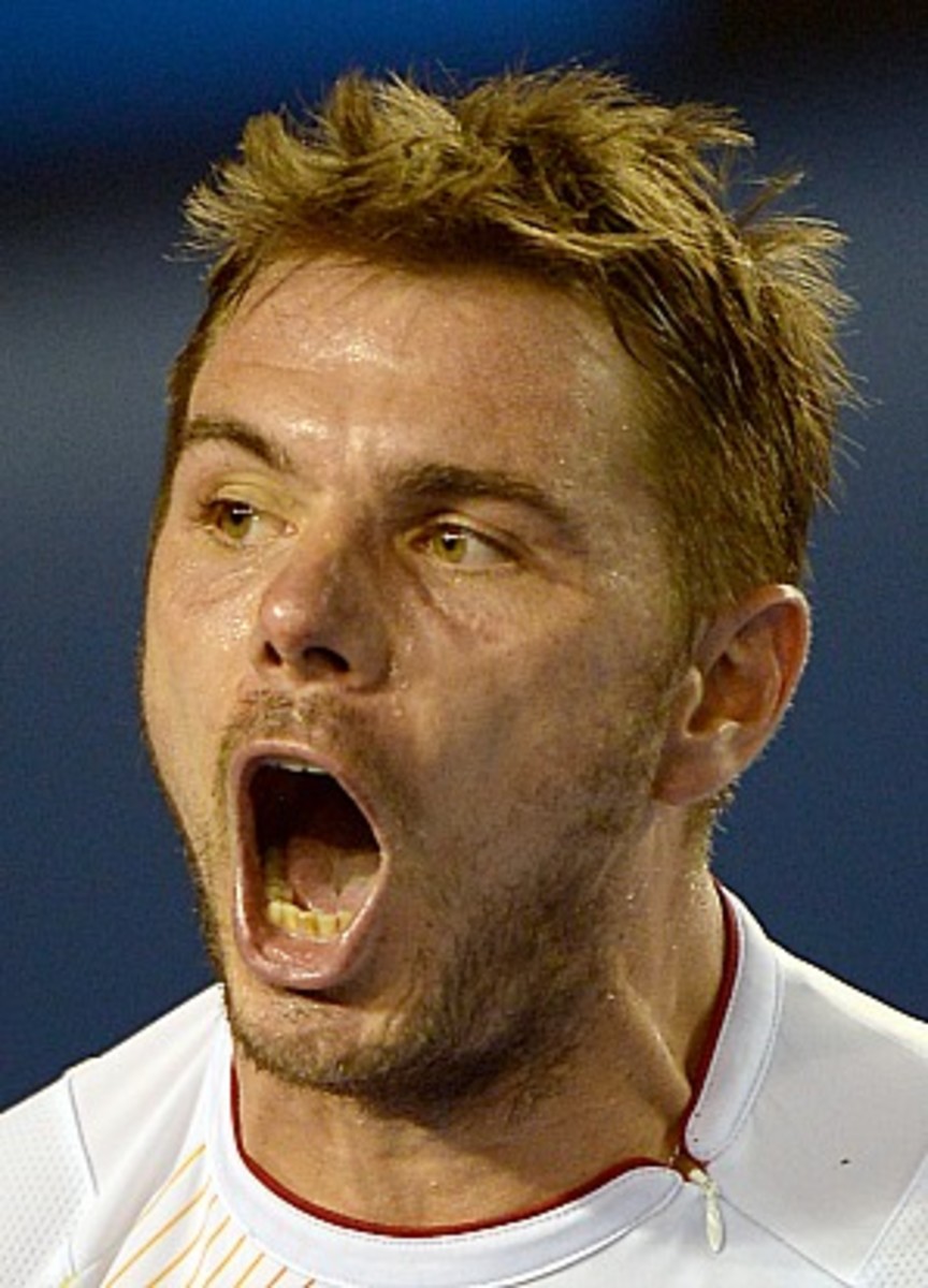 Stanislas Wawrinka gets fired up. (Greg Wood/AFP/Getty Images)