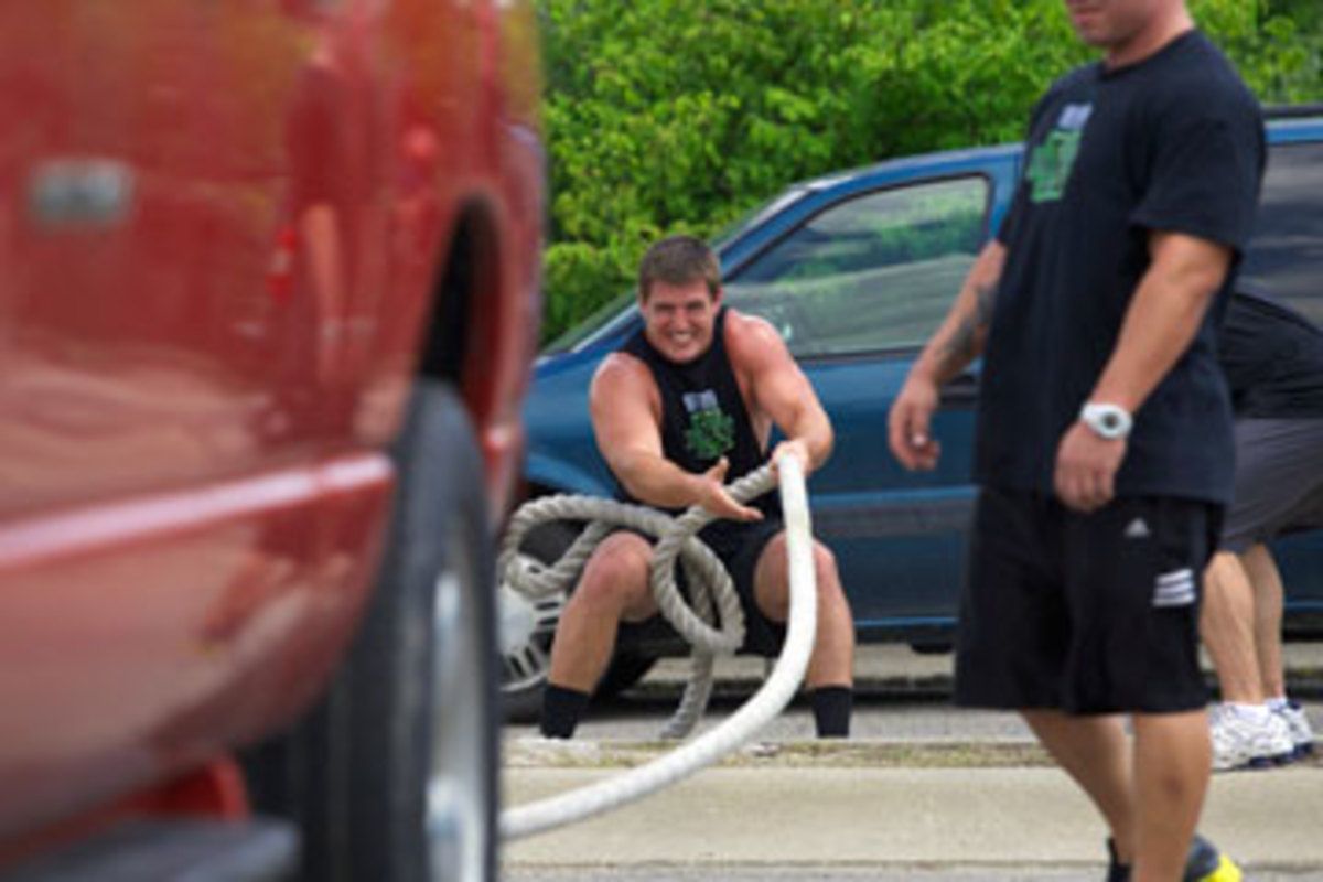 Despite his torn shoulder labrum, Line was able to pull this truck last July. (John DePetro/The MMQB)