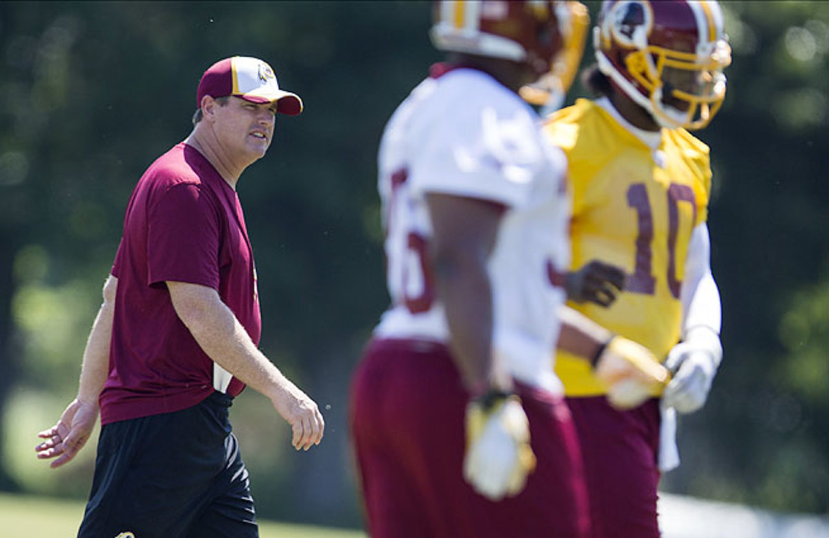 Jay Gruden (left) is looking to blend elements of his offense in Cincinnati with the Redskins' incumbent strengths.