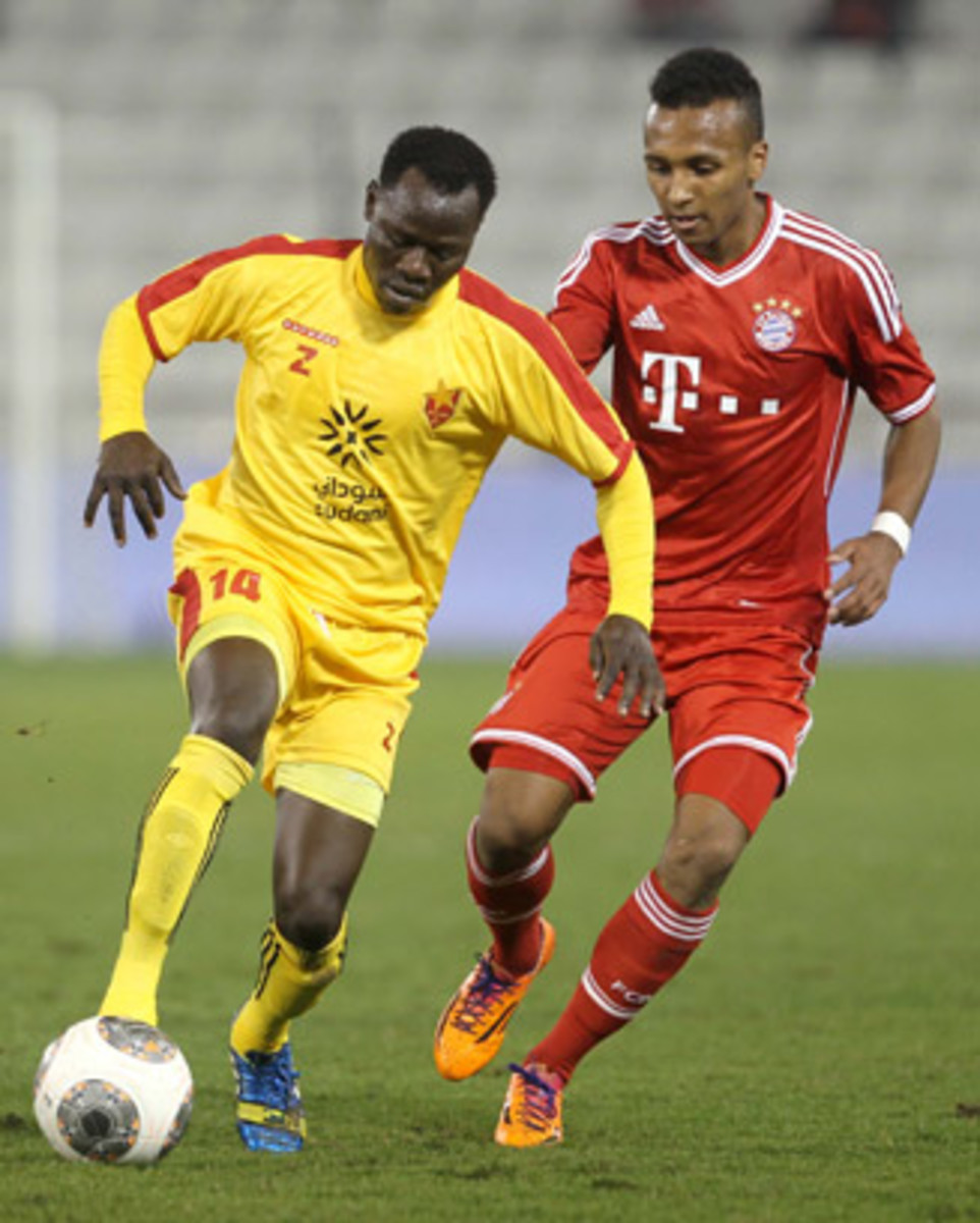 Julian Green, right, defends against Balla Jabir of Al-Merrikh during their friendly at Al-Saad stadium on Jan. 9.