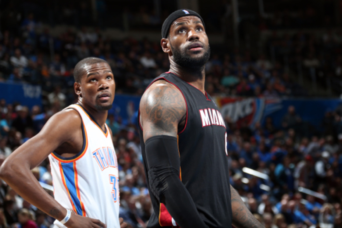 Kevin Durant (left) and LeBron James (right) can turn their attention to chasing a title during the 2014 NBA Playoffs. (Layne Murdoch/Getty Images)