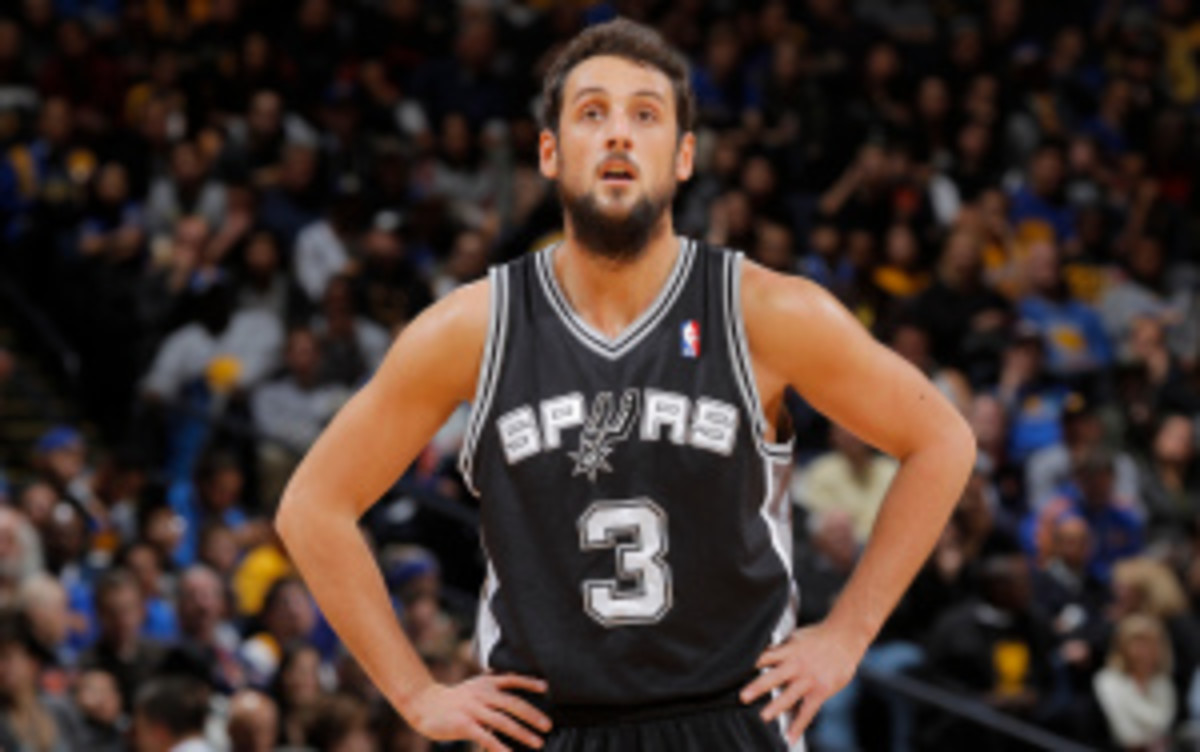 Players that could be going up against Marco Belinelli include guards Kyrie Irving from the Cavaliers and Kendall Marshall from the Lakers. (Rocky Widner/Getty Images)