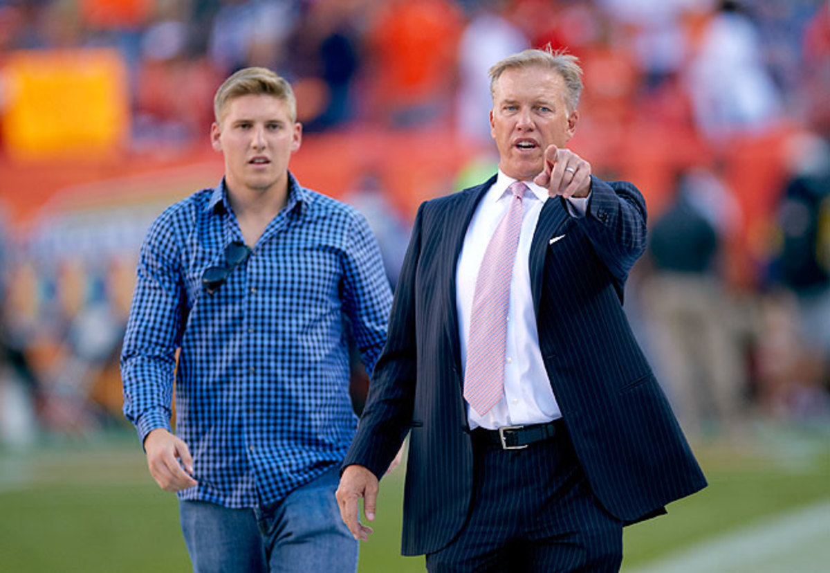 Jack Elway, left, was arrested following an incident in downtown Denver on Saturday.