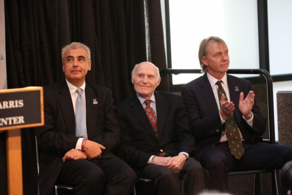 Former Bucks owner Herb Kohl with current owners Wesley Edens and Marc Lasry, hedge fund billionaires who bought the team for $550 million. (Gary Dineen/Getty Images)