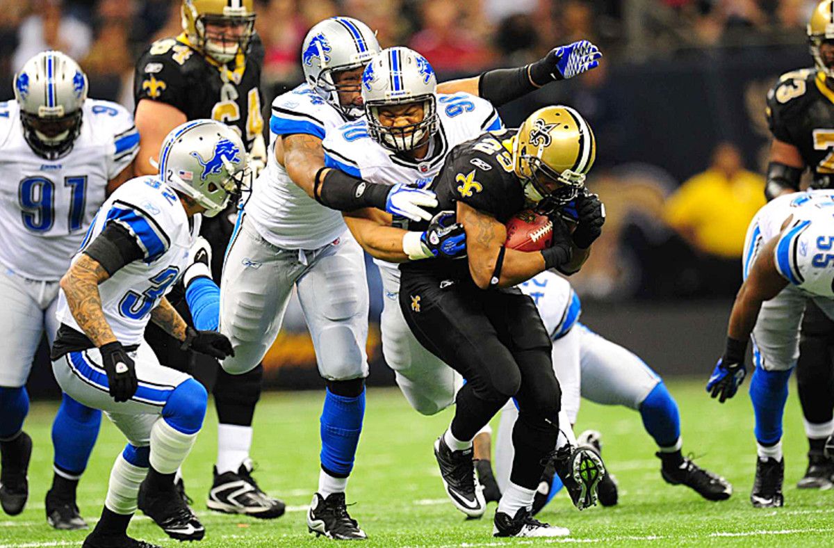 Ndamukong Suh and the front four will key a new-look defense. (Al Tielemans/Sports Illustrated)
