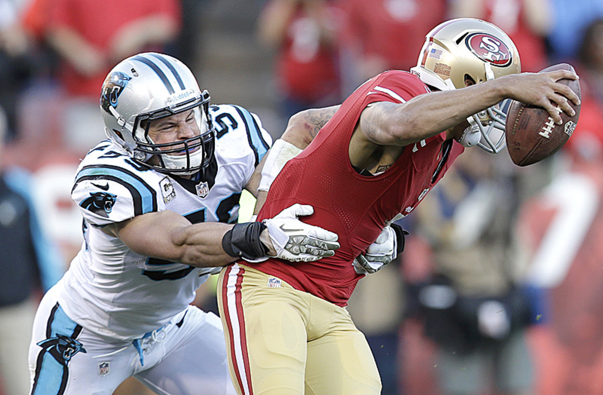 Reining NFL Defensive Player of the Year Luke Kuechly anchors a front seven that is still one of the NFL's best. (Marcio Jose Sanchez/AP)
