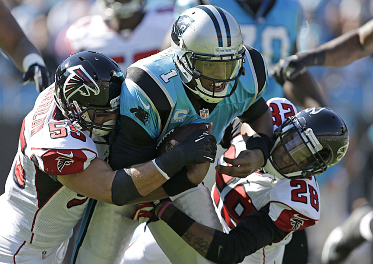 Cam Newton will have his work cut out for him this fall. (Bob Leverone/AP)