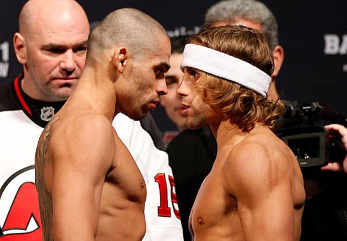 Renan Barao (left) and Urijah Faber face off during the UFC 169 weigh-in at the Prudential Center in Newark, New Jersey. (Josh Hedges/Zuffa LLC/Zuffa LLC via Getty Images)