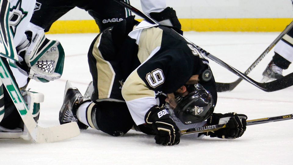 Pittsburgh Penguins forward Pascal Dupuis was taken off the ice on a