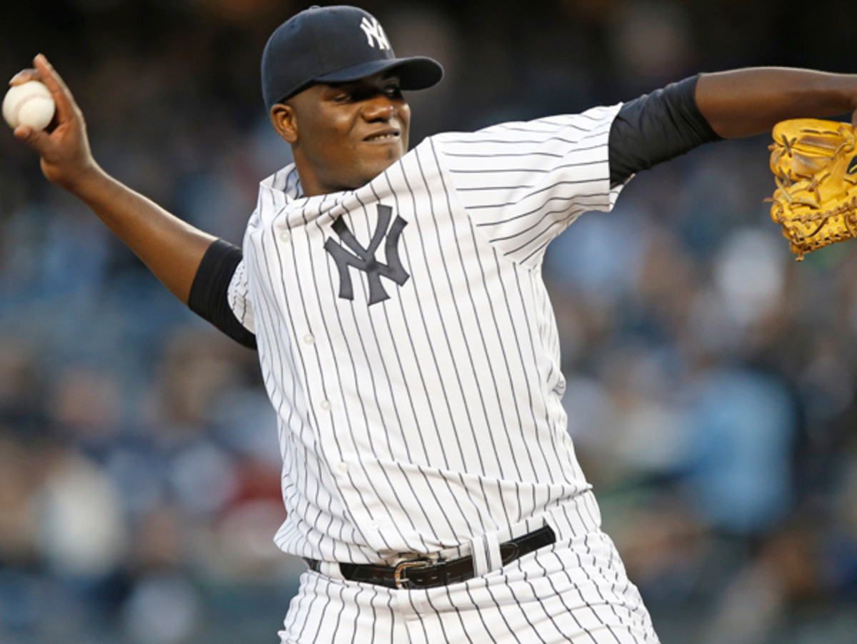 Michael Pineda suffered a strain of his right lat during a simulated start Tuesday. (Kathy Willens/AP)