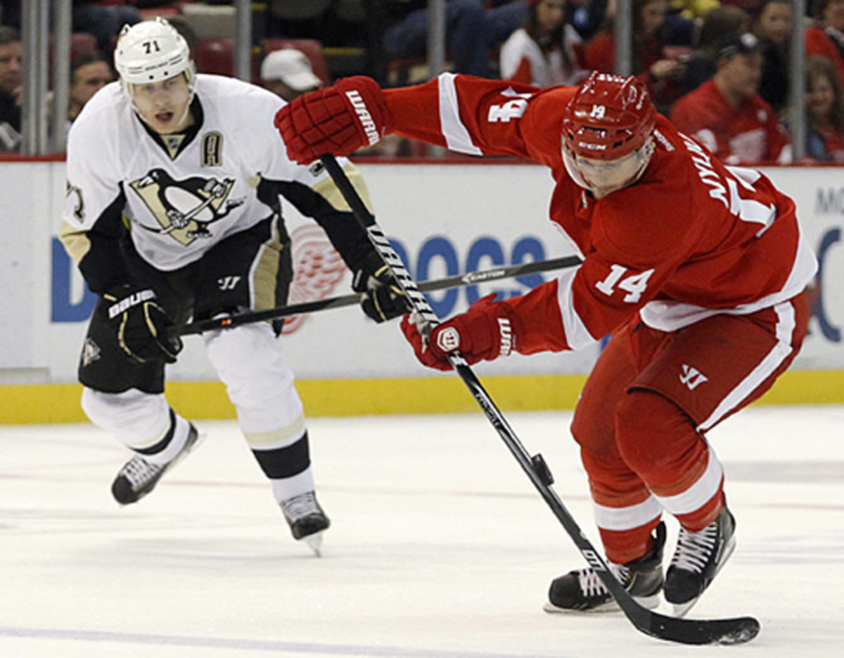 Evgeni Malkin of Pittsburgh Penguins and Gustav Nyquist of the Detroit Red Wings