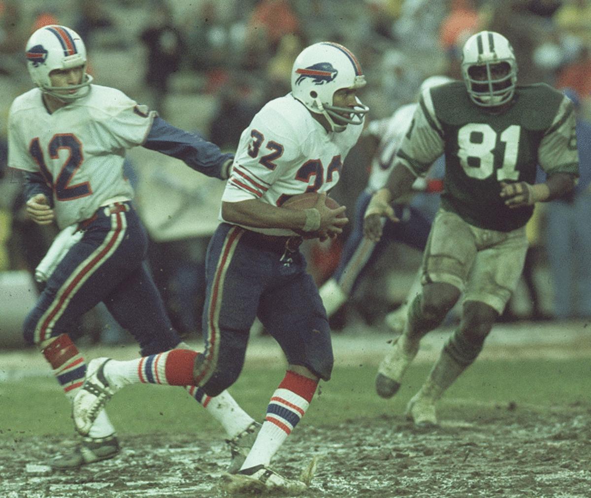 As a Bill, Simpson won four rushing titles and became the first back to run for 2,000 yards in a season.