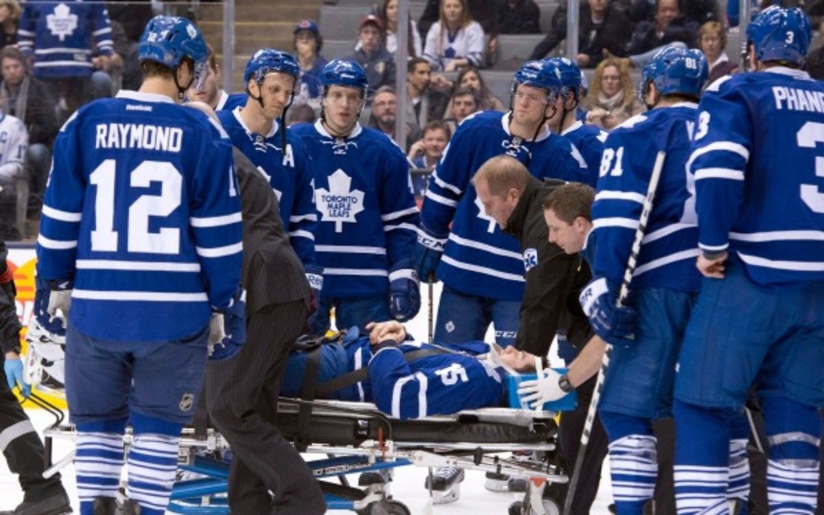 Maple Leafs defenseman Paul Ranger is stable after a hit against the boards. (AP Photo/The Canadian Press, Frank Gunn)